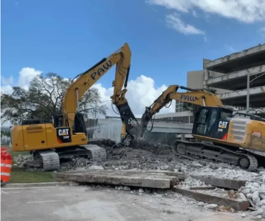 PAW excavators performing demolition